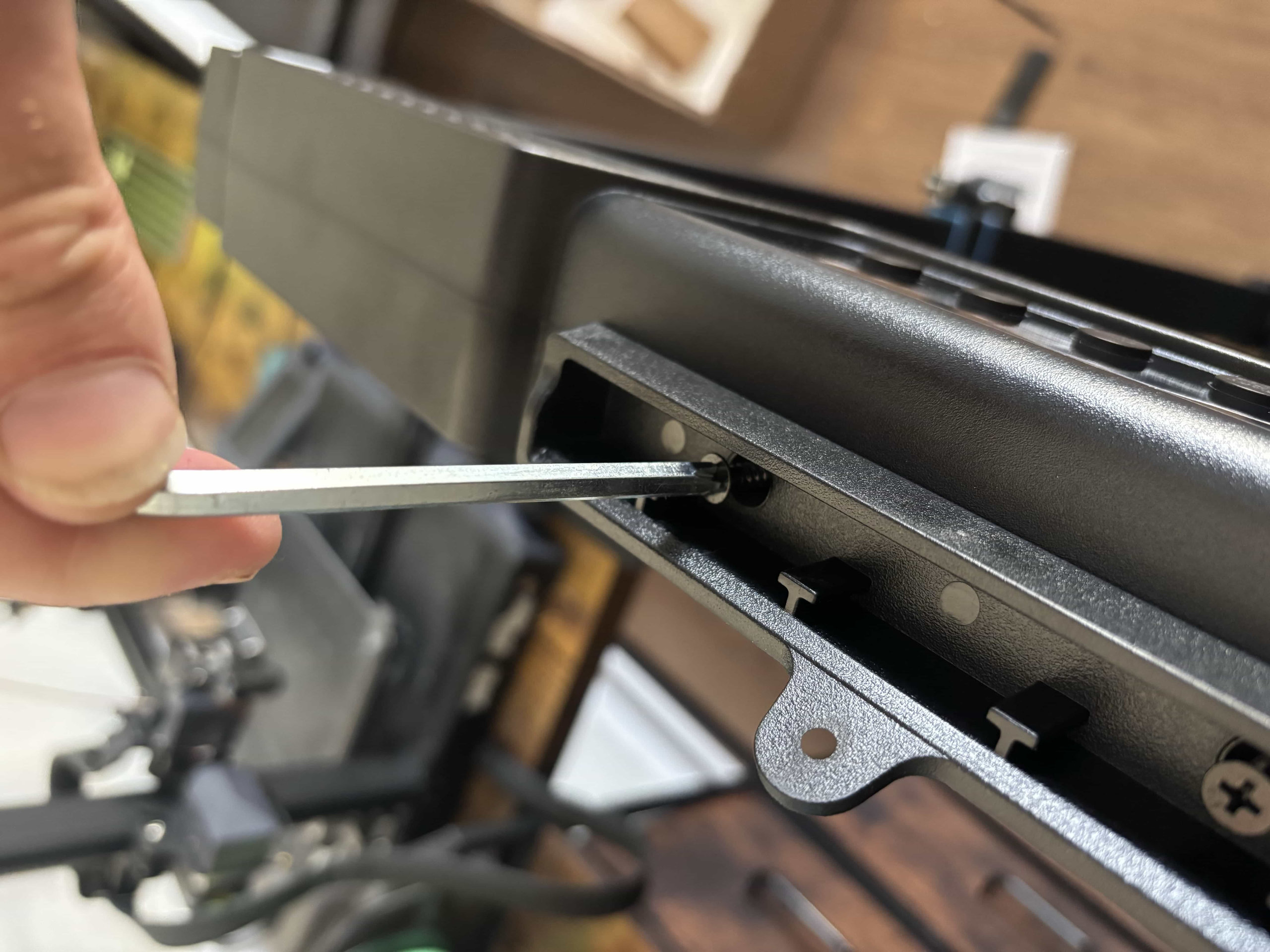 Fitting the tablet holder with three screws