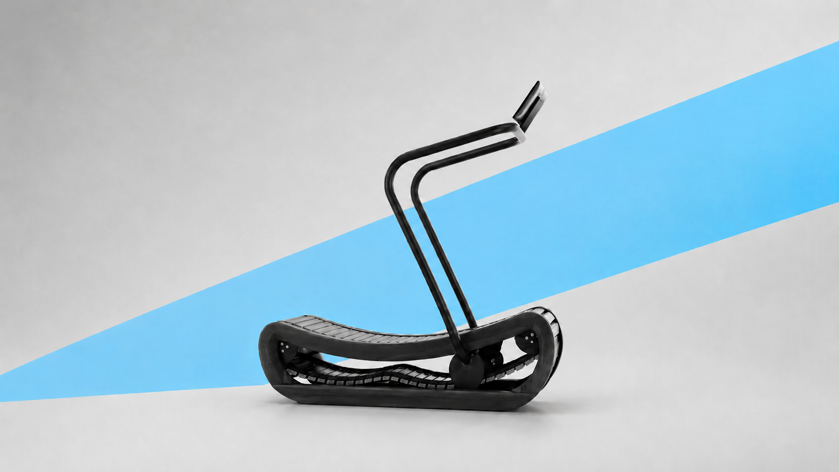 curved manual treadmill with a slatted concave running belt
