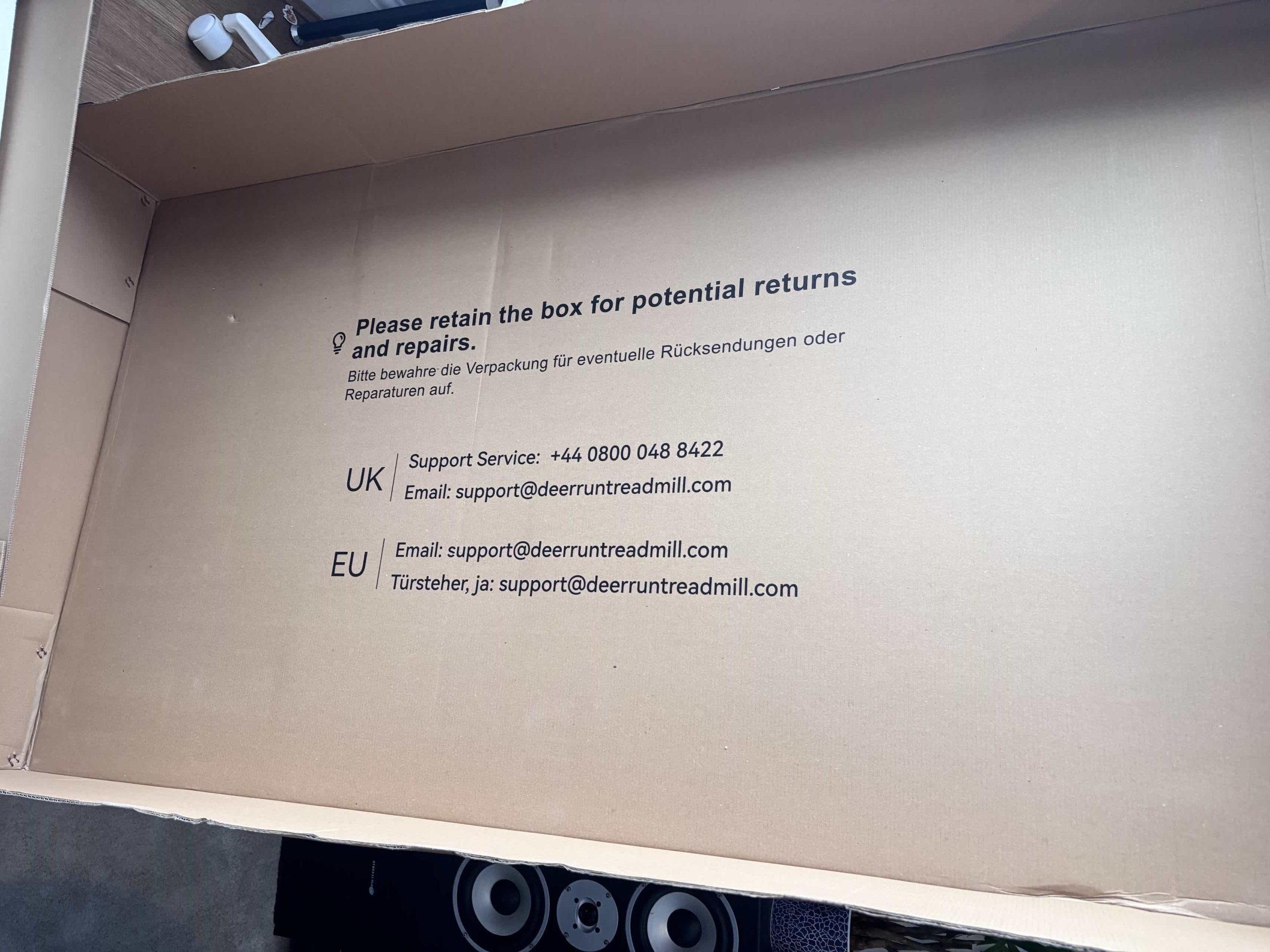 UK and EU support contact details printed inside the box lid