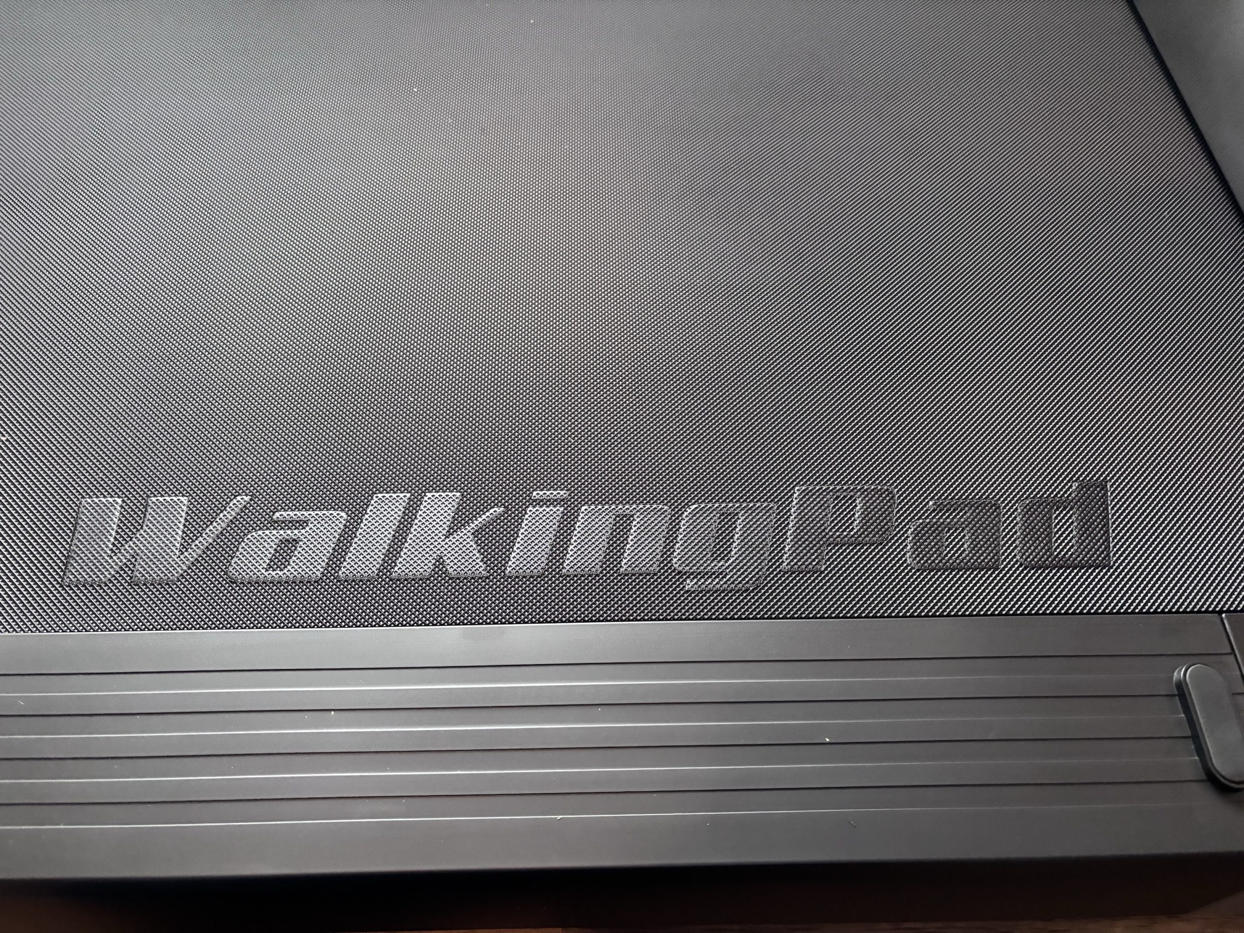 Close-up of the running belt with embossed WalkingPad branding and grip texture