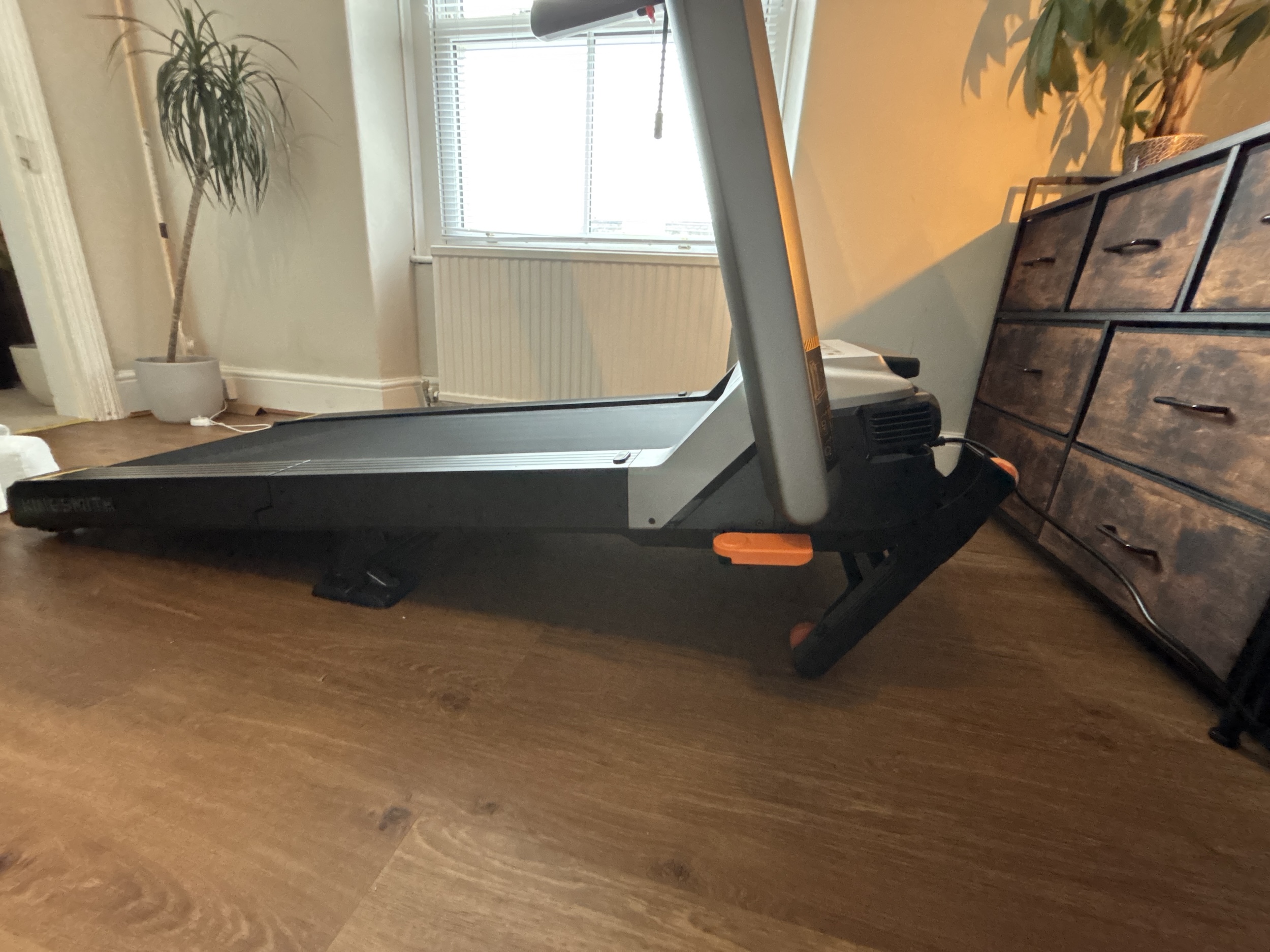 Side view of the WalkingPad G5i at its maximum 18% incline