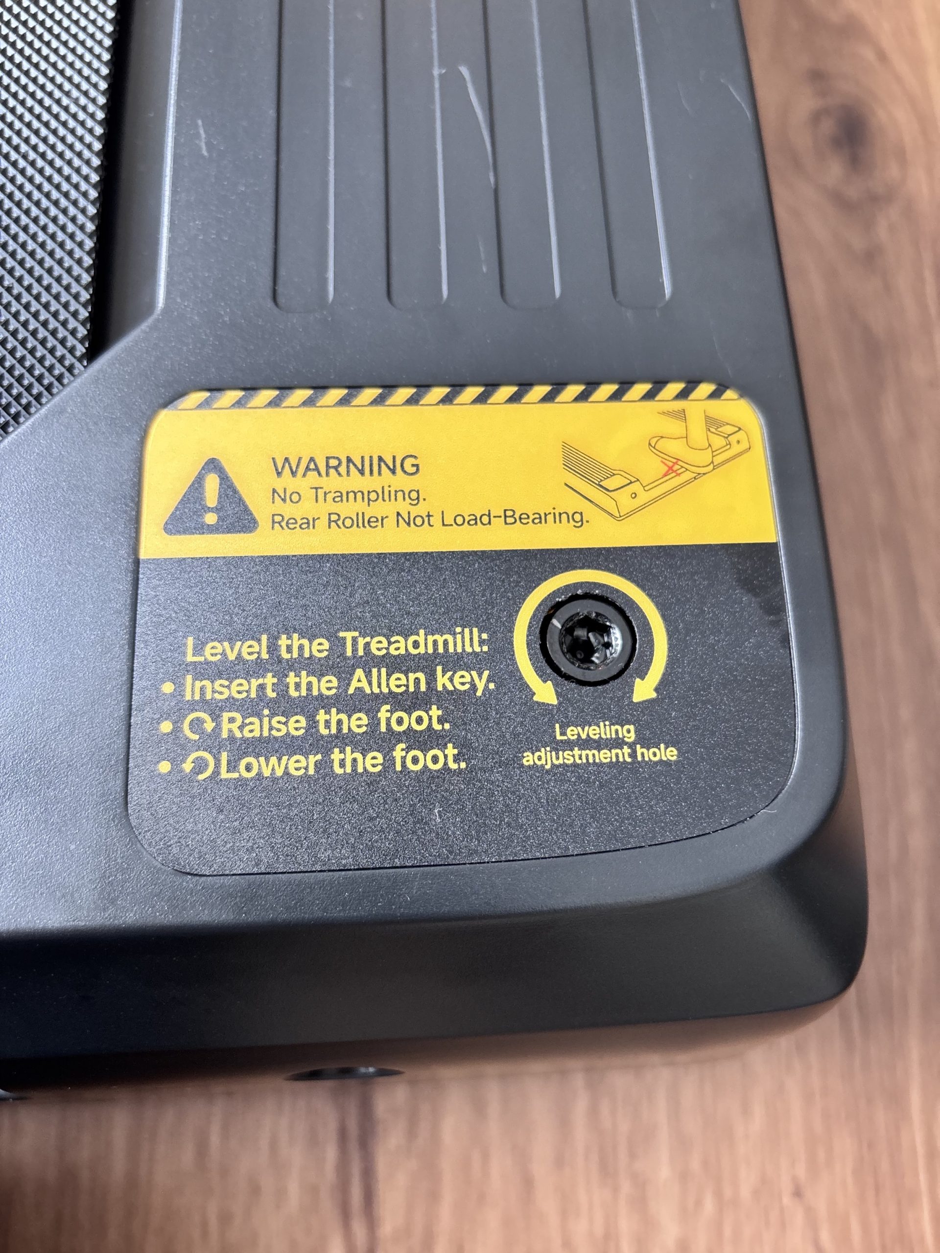 Levelling the deck feet with the supplied key