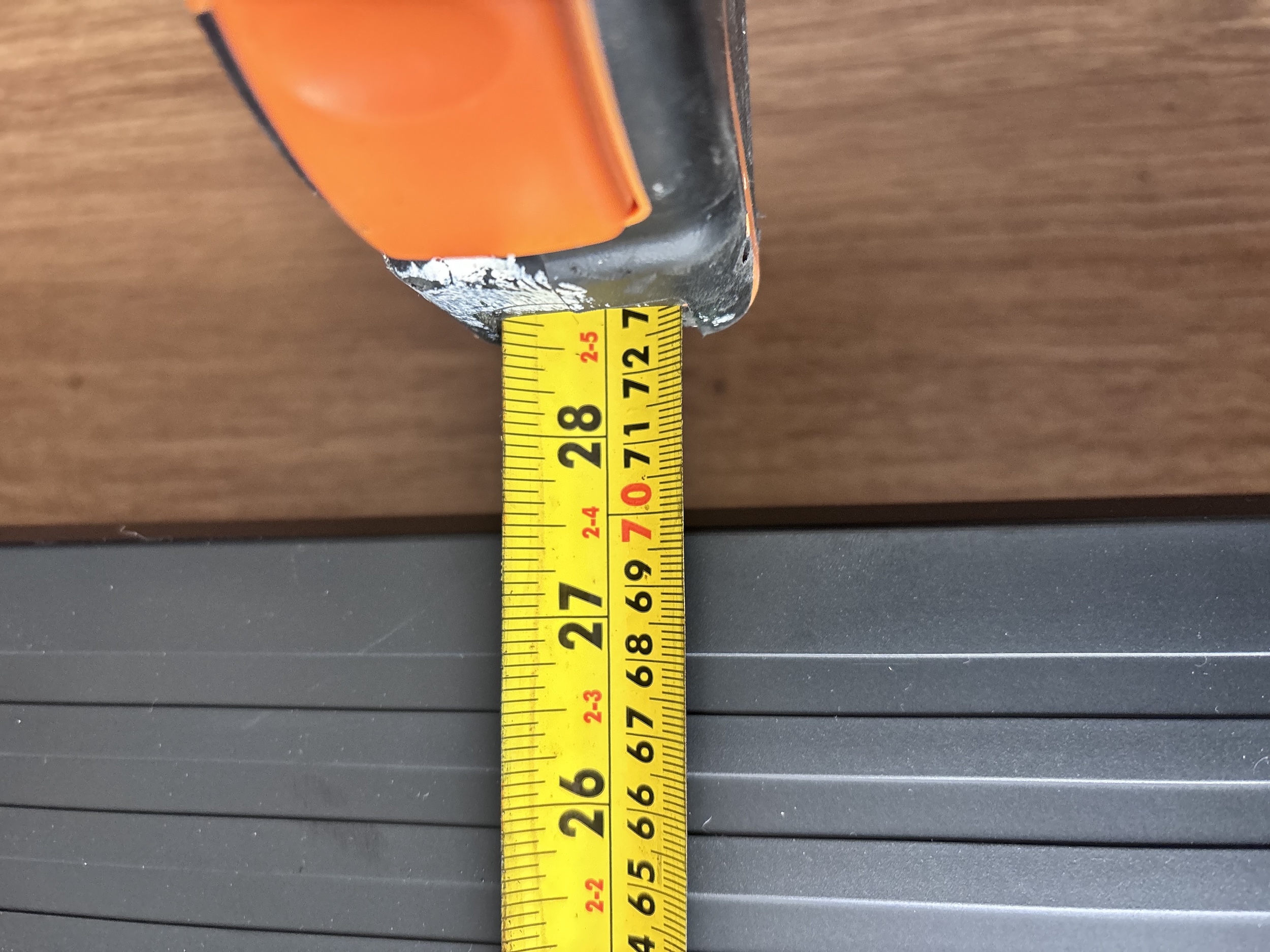 Tape measure showing the deck is around 70 cm wide