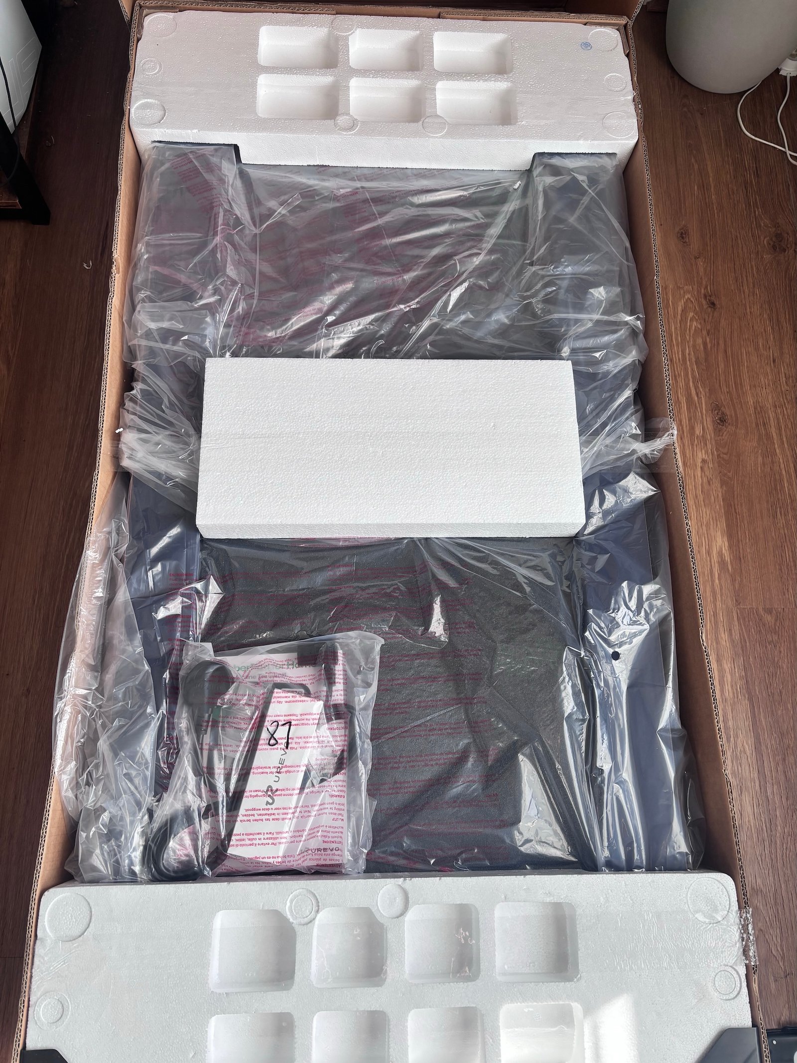 UREVO CyberPad protected by foam packaging inside its shipping box