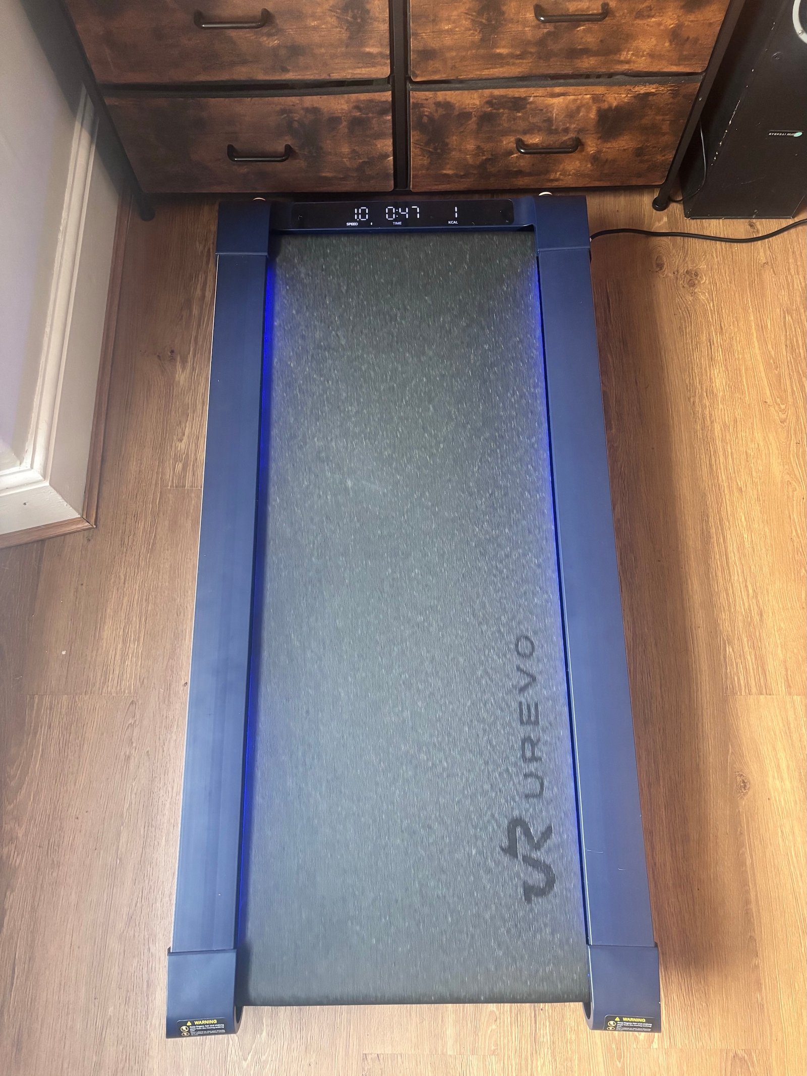 Overhead view of the UREVO CyberPad walking belt, side rails and deck display